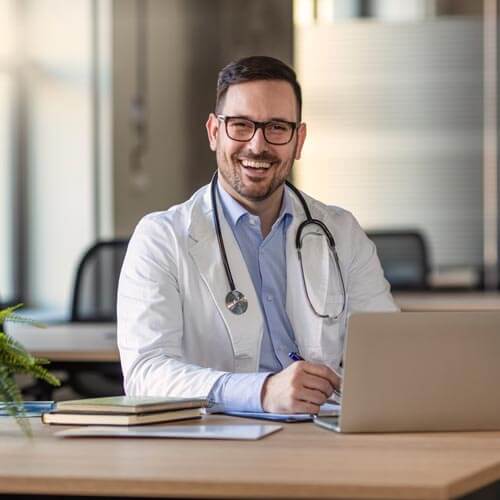 A doctor getting benefits from hiring a virtual medical assistant.