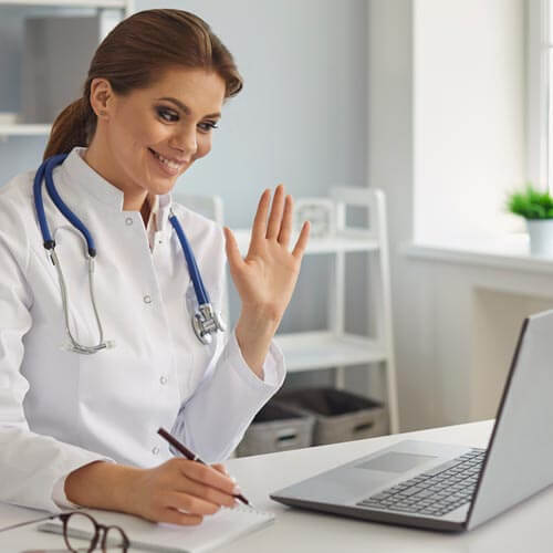 A doctor starting her day at office by briefing her virtual front desk